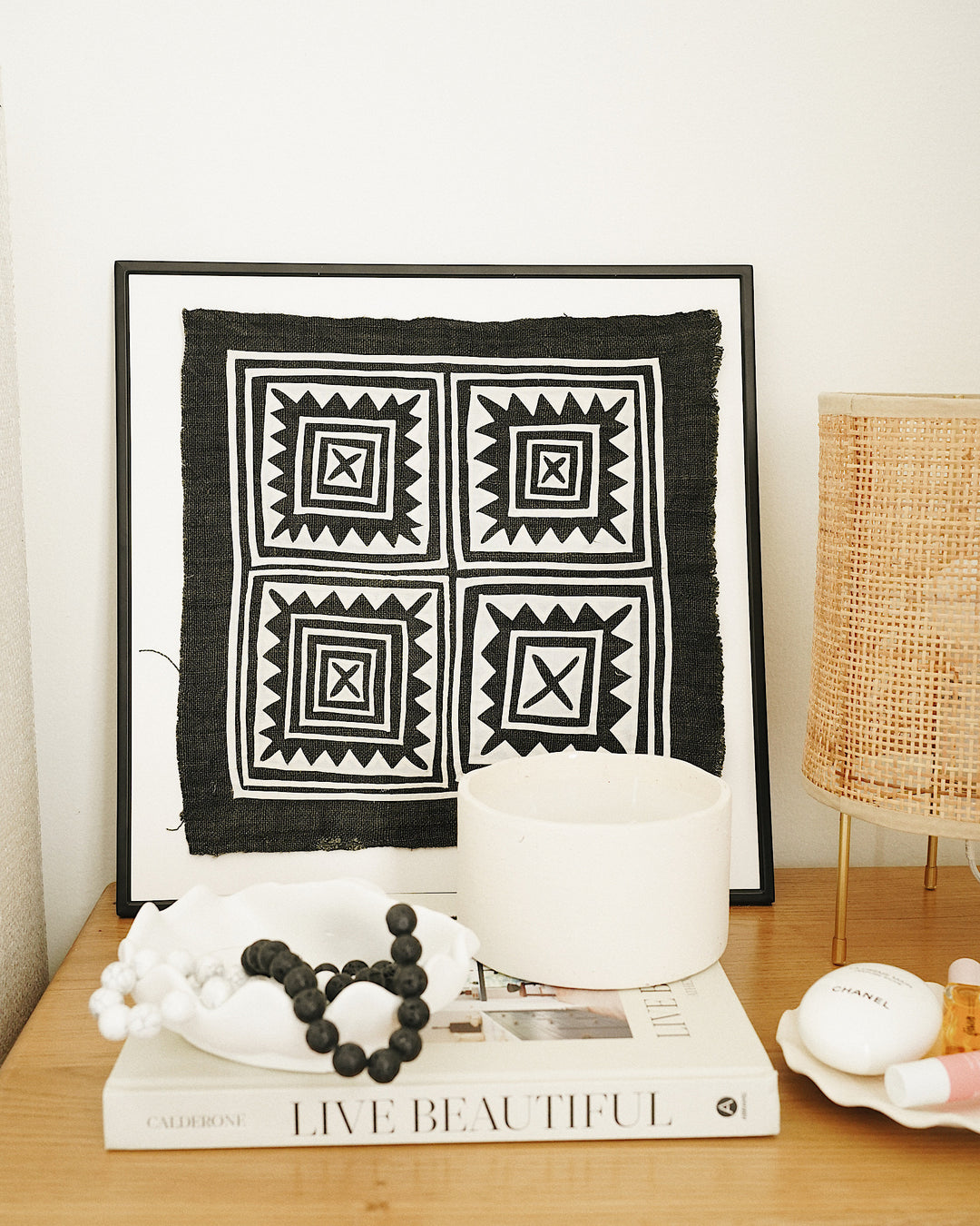 Naya Vintage Hand Embroidered Textile Wall Art By CallaForma on bedside table