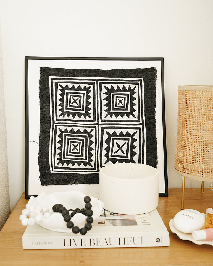 Naya Vintage Hand Embroidered Textile Wall Art By CallaForma on bedside table