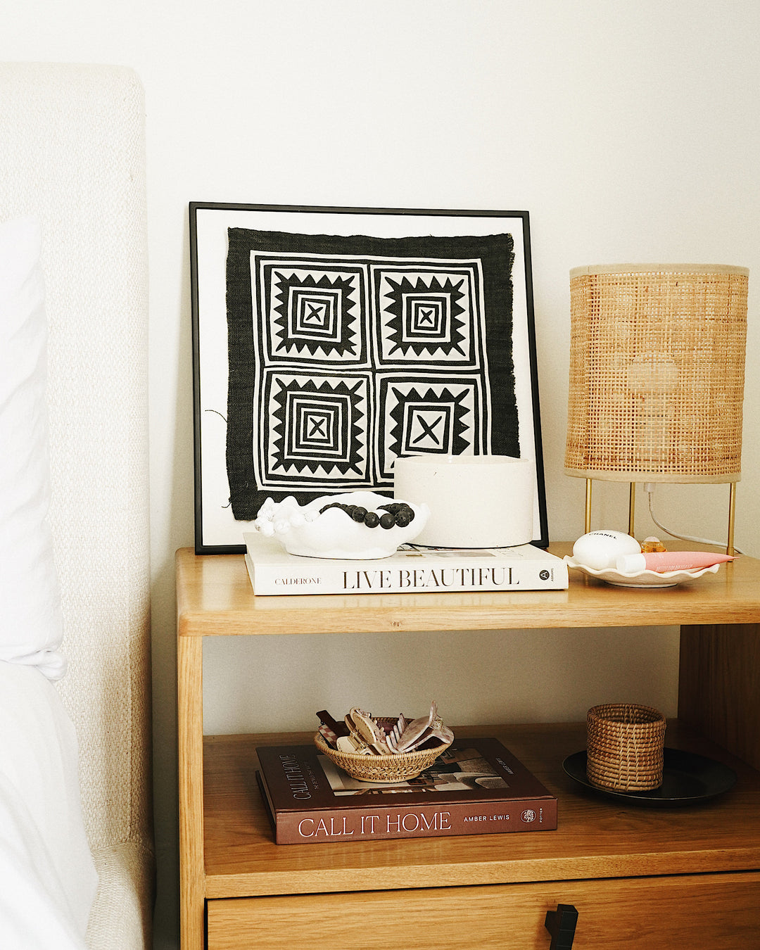 Naya Vintage Hand Embroidered Textile Wall Art By CallaForma on bedside table