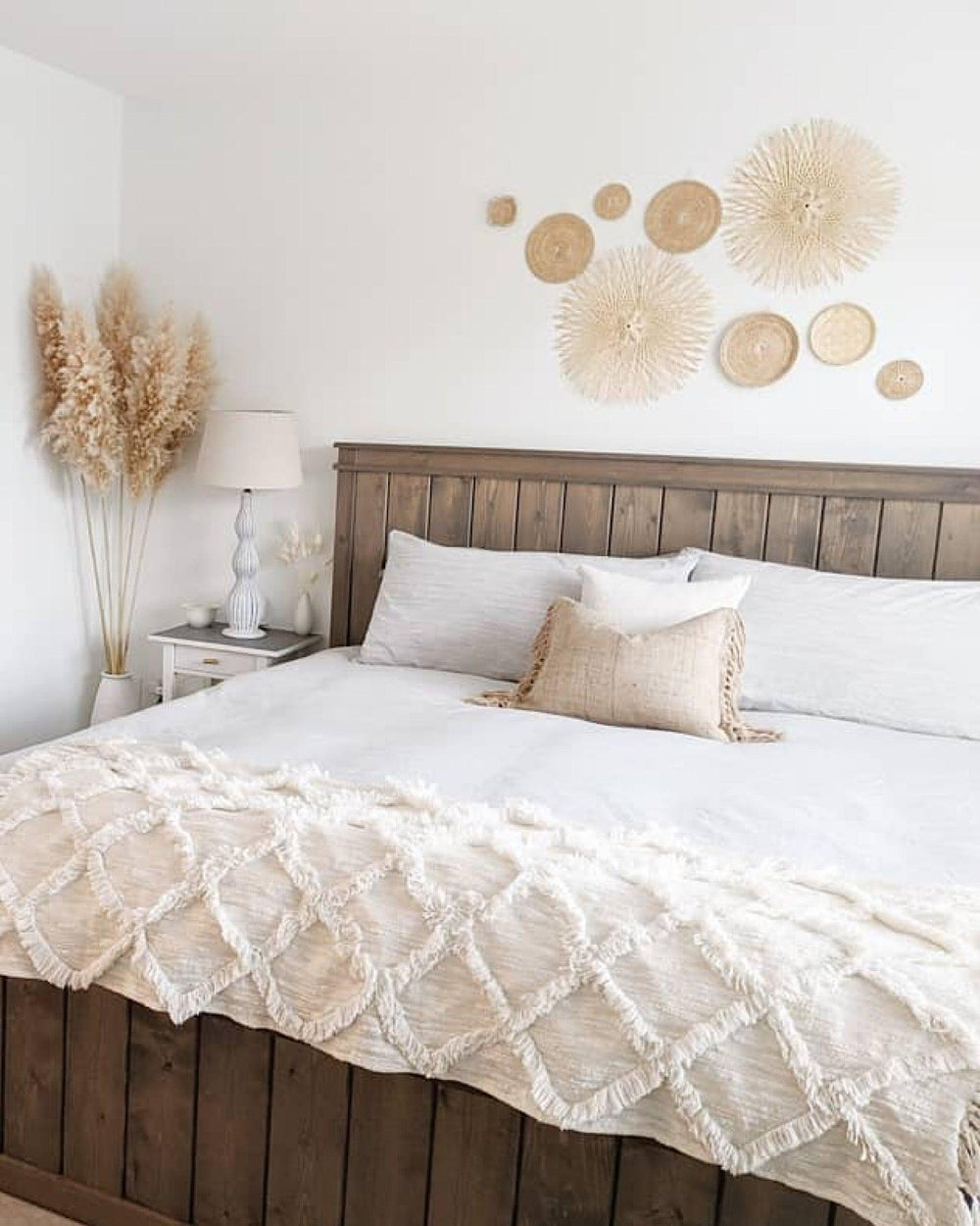 No. 14 Basket Wall Hanging Set of 9 displayed on a wall, adding warmth and charm to a modern living space.