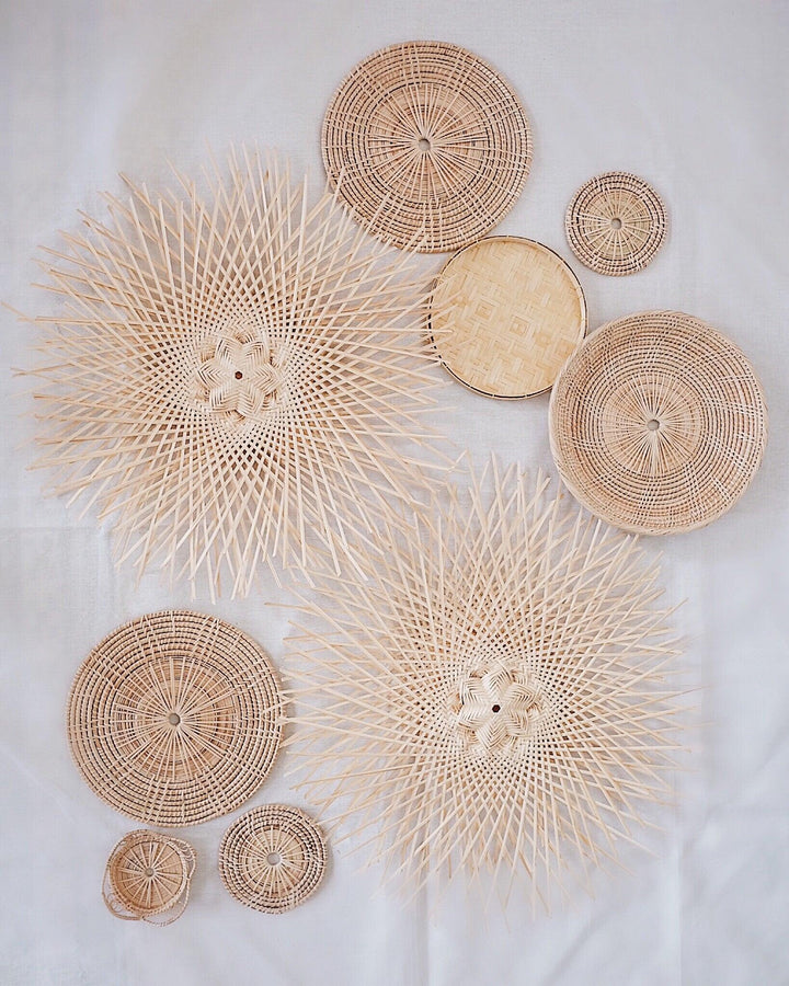 No. 14 Basket Wall Hanging Set of 9 featuring handcrafted, woven baskets in various natural textures and designs.