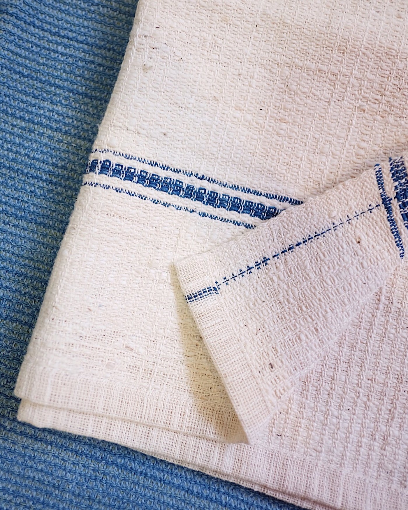 White Handwoven Organic Cotton Hand Towel with Dark Blue Stripe