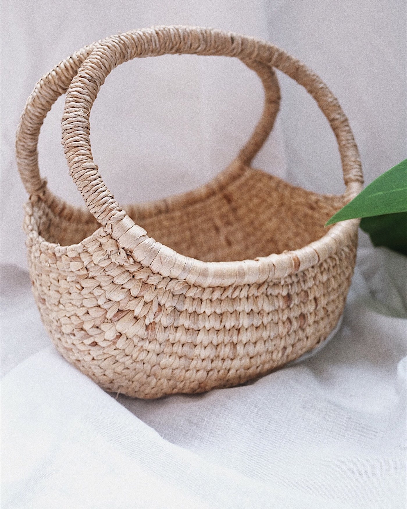 Hand woven water hyacinth basket - Olive and Iris